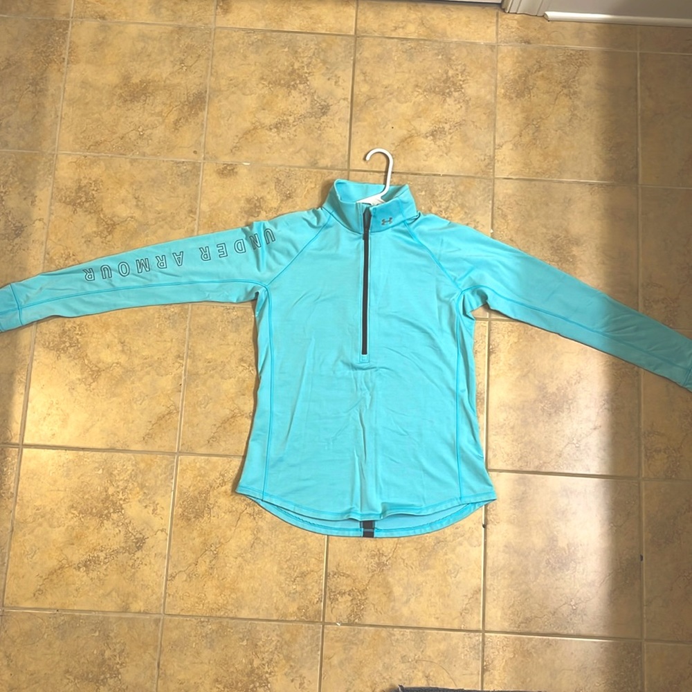 Never worn- A women's Under Armour sport pullover coat